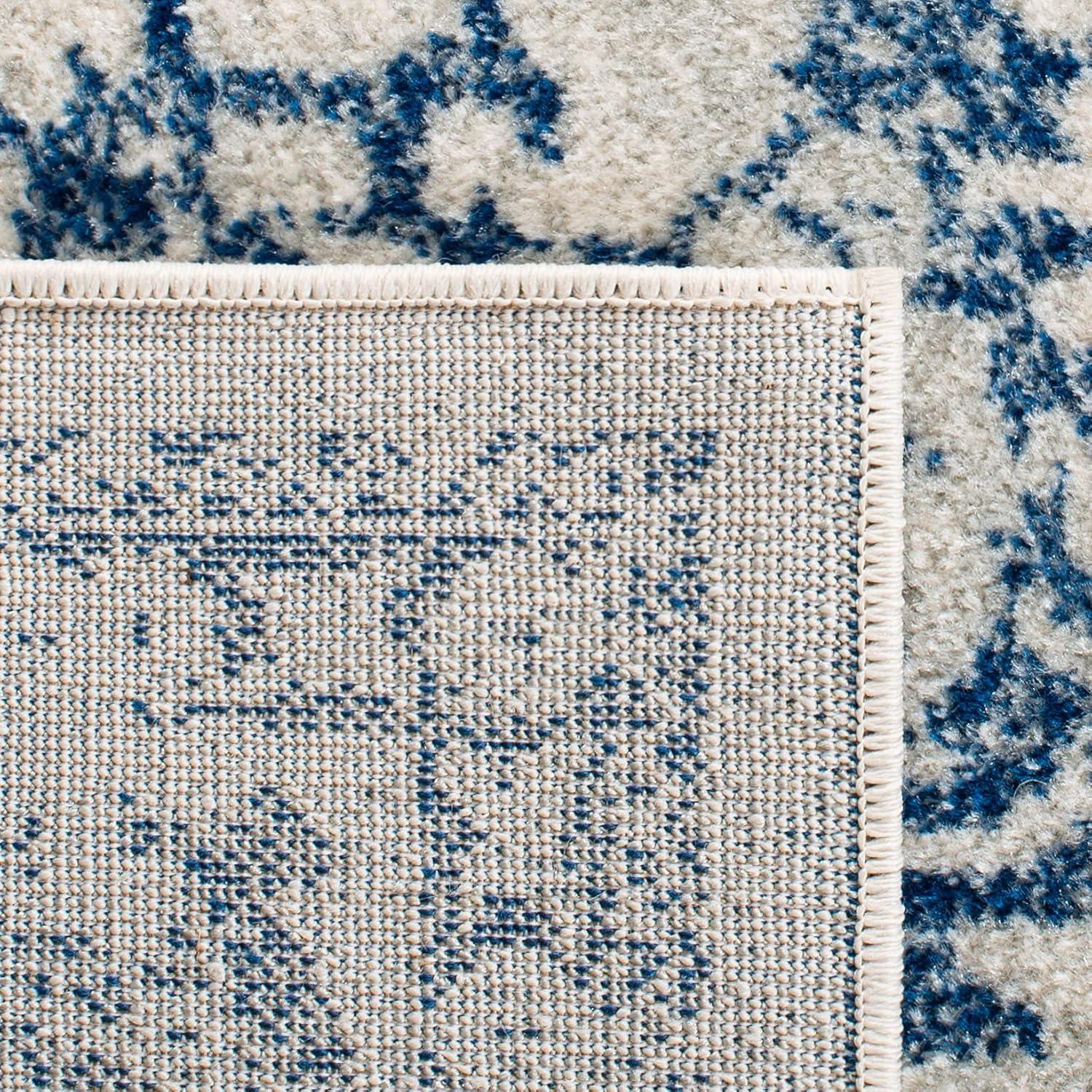 image:imageSAFAVIEH Evoke Collection Area Rug 51 x 76 Blue amp Ivory Distressed Design NonShedding amp Easy to Clean Ideal for Living Room Bedroom Dining Space EVK256CIvoryNavy