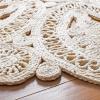 SAFAVIEH Area Rug 4′ Round – Natural Fiber Collection – Navy, Handmade Jute, Decorative Boho Floral Design (NF360N)(Ivory)