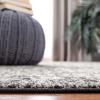 SAFAVIEH Evoke Collection Area Rug – 5’1″ x 7’6″, Blue & Ivory, Distressed Design, Non-Shedding & Easy to Clean, Ideal for Living Room, Bedroom, Dining Space (EVK256C)(Black/Grey)