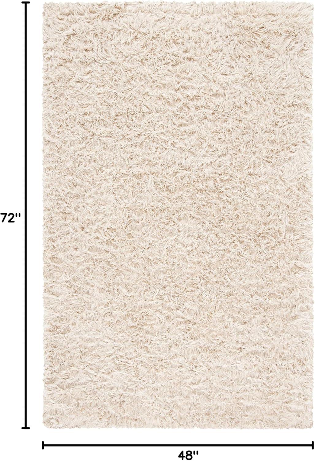 image:imageSAFAVIEH Faux Sheep Skin Collection 3 x 5 Ivory FSS235A Silken Glam 235inch Thick Area RugBeige