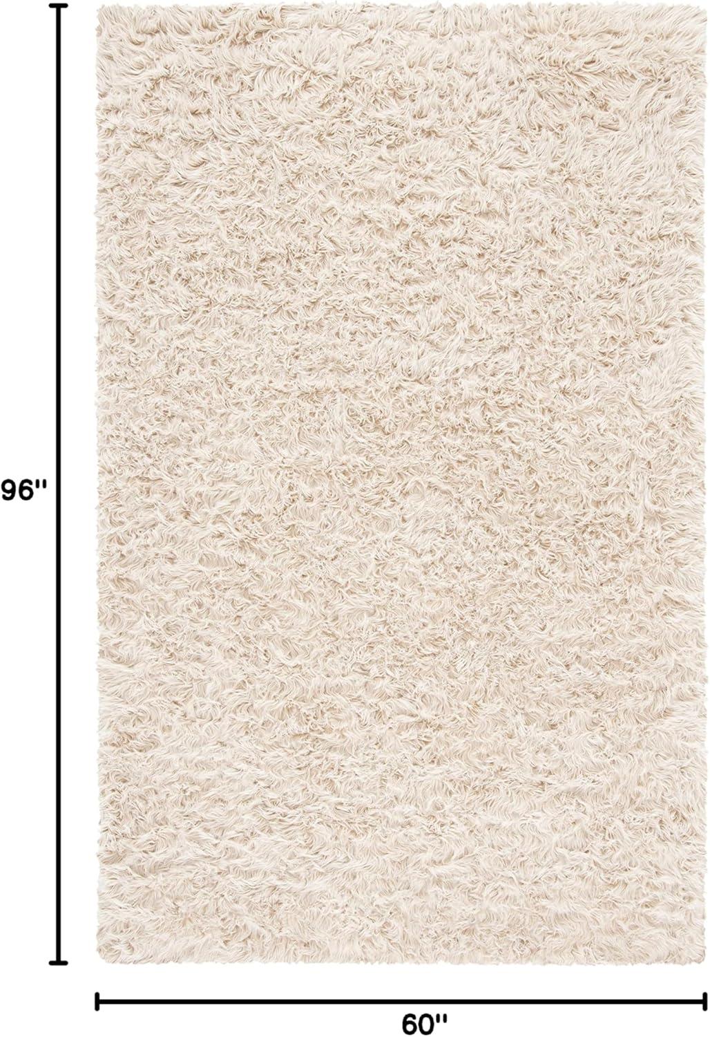 image:imageSAFAVIEH Faux Sheep Skin Collection 3 x 5 Ivory FSS235A Silken Glam 235inch Thick Area RugBeige