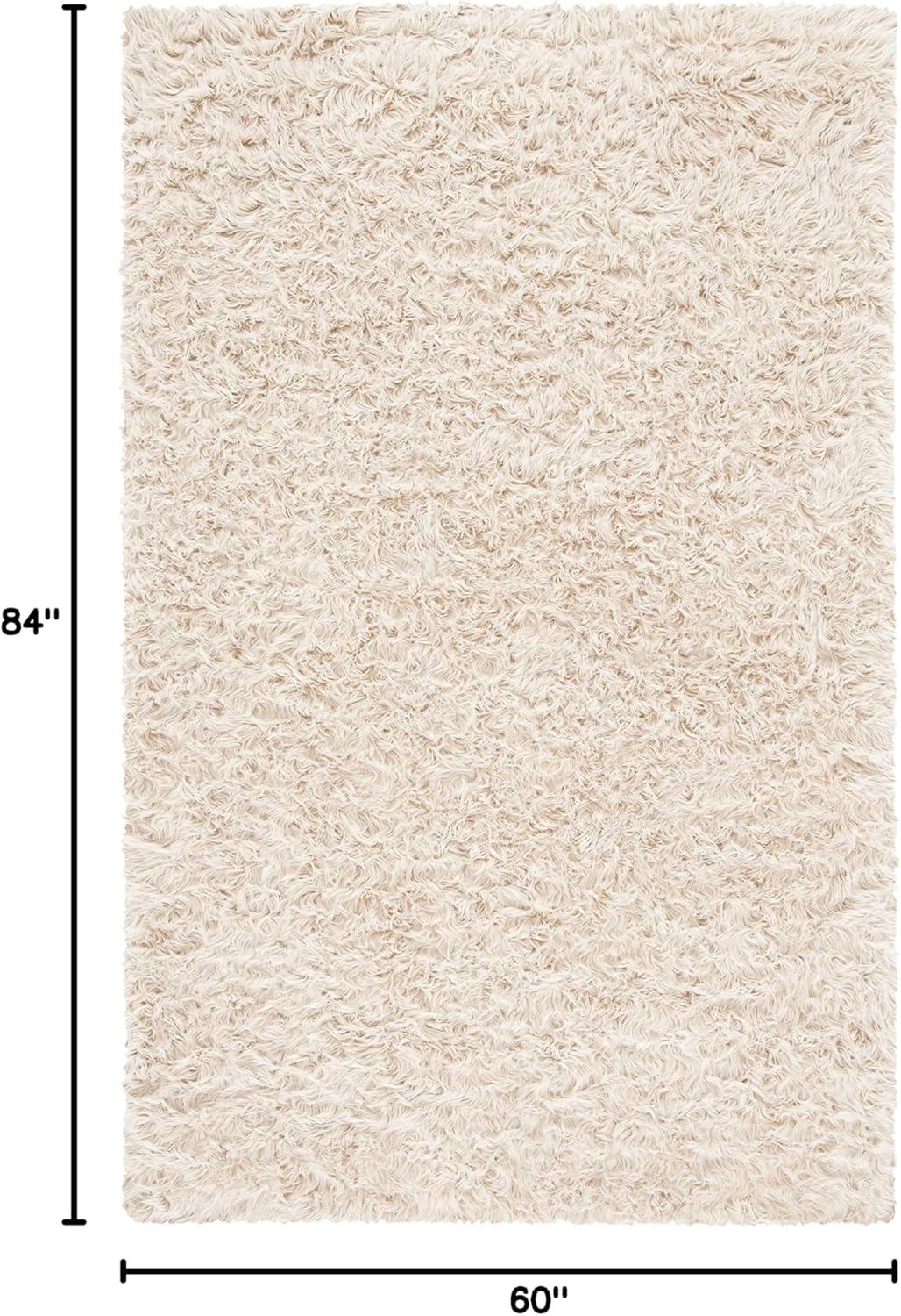 image:imageSAFAVIEH Faux Sheep Skin Collection 3 x 5 Ivory FSS235A Silken Glam 235inch Thick Area RugBeige