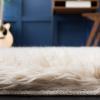 SAFAVIEH Faux Sheep Skin Collection 3′ x 5′ Ivory FSS235A Silken Glam 2.35-inch Thick Area Rug(Beige)