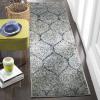 SAFAVIEH Madison Collection Area Rug – 5’3″ x 7’6″, Creme & Yellow, Glam Ogee Trellis Distressed Design, Non-Shedding & Easy Care, Ideal for High Traffic Areas in Living Room, Bedroom (MAD604C)(Navy/Silver)