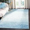 SAFAVIEH Madison Collection Area Rug – 5’3″ x 7’6″, Creme & Yellow, Glam Ogee Trellis Distressed Design, Non-Shedding & Easy Care, Ideal for High Traffic Areas in Living Room, Bedroom (MAD604C)(Blue/Turquoise)