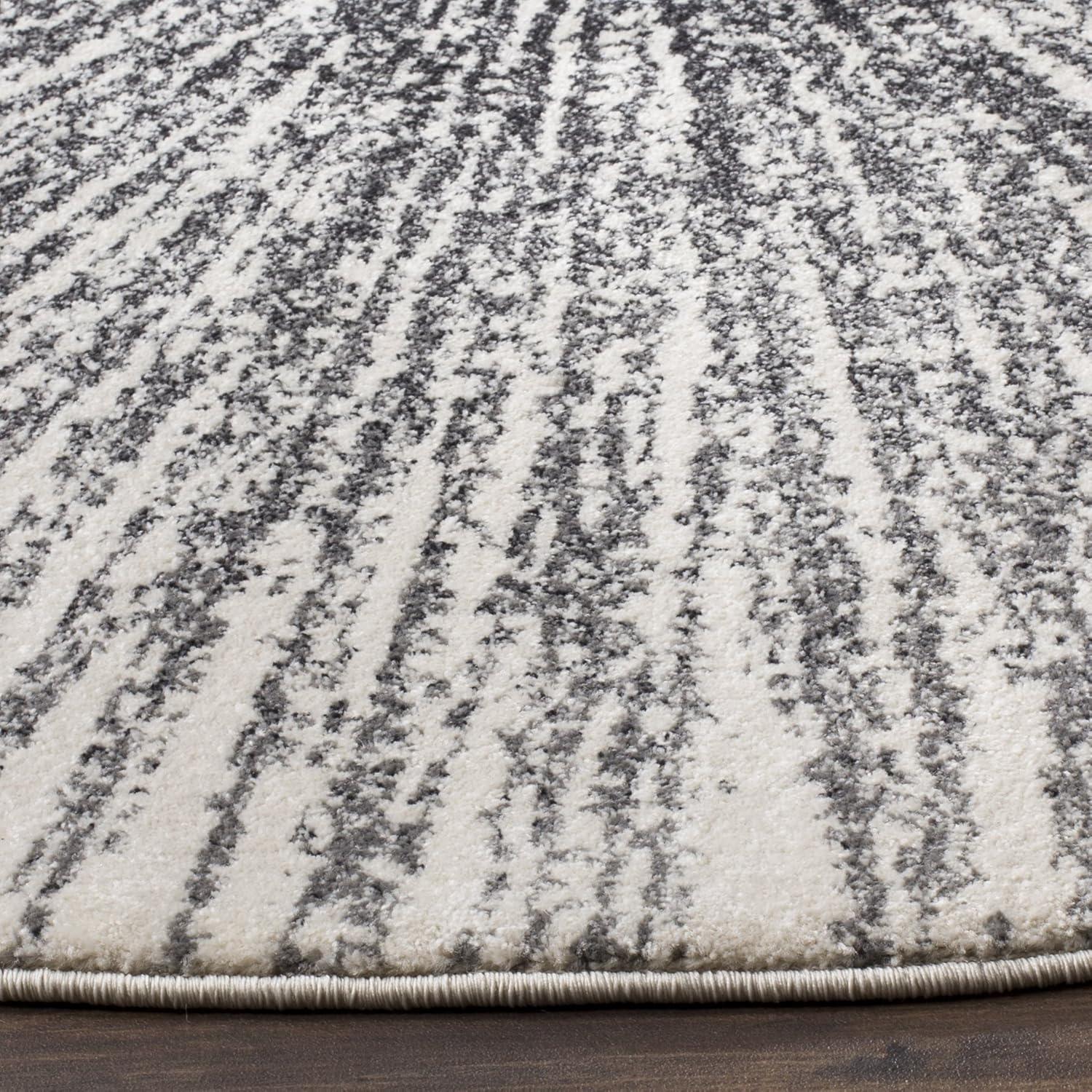 image:imageSAFAVIEH Evoke Collection 51 x 76 FuchsiaCream EVK228R Abstract Burst NonShedding Living Room Bedroom Area RugBlackIvory