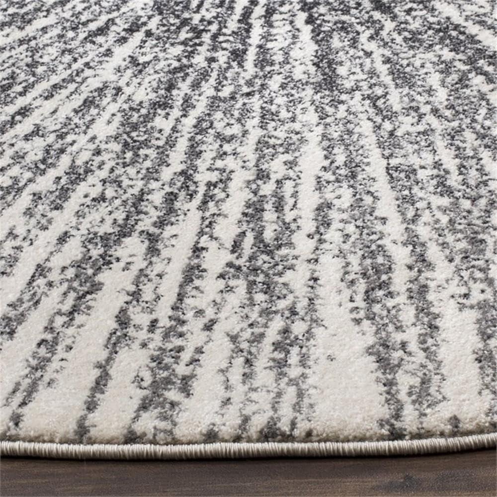 image:imageSAFAVIEH Evoke Collection 51 x 76 FuchsiaCream EVK228R Abstract Burst NonShedding Living Room Bedroom Area RugBlackIvory