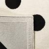 SAFAVIEH Kids Collection Area Rug – 5′ x 7′, Ivory & Black, Handmade Polka Dot Wool, Ideal for High Traffic Areas in Living Room, Bedroom (SFK904D)(Ivory/Black)