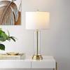 SAFAVIEH Lighting Collection Cassian Modern Contemporary Farmhouse Clear Glass 26-inch Bedroom Living Room Home Office Desk Nightstand Table Lamp (LED Bulb Included)(Clear/Brass)