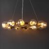 SAFAVIEH Lighting Collection Rylian Black 12-Light Round Hanging Adjustable Chandelier Light Fixture (LED Bulbs Included)(Brass)