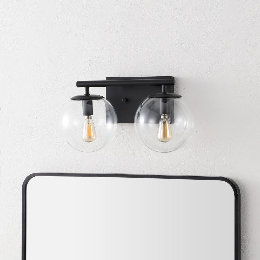 image:imageSAFAVIEH Lighting Collection Severa BrassClear Glass Globe Shade 2Light Wall Sconce Light Fixture Ideal for Bathroom Entryway Vanity Foyer Hallway Living Room LED Bulb IncludedBlack