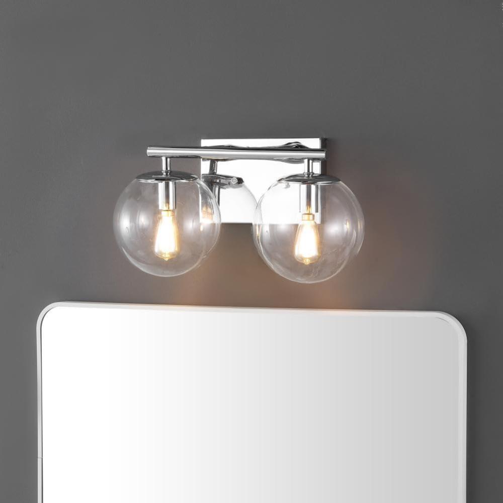 image:imageSAFAVIEH Lighting Collection Severa BrassClear Glass Globe Shade 2Light Wall Sconce Light Fixture Ideal for Bathroom Entryway Vanity Foyer Hallway Living Room LED Bulb IncludedChrome