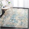 SAFAVIEH Madison Collection Area Rug – 5’3″ x 7’6″, Grey & Beige, Modern Abstract Design, Non-Shedding & Easy Care, Ideal for High Traffic Areas in Living Room, Bedroom (MAD453A)(Teal/Gold)