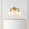 SAFAVIEH Lighting Collection Navia Brass/Clear Glass Shade 2-Light Wall Sconce Light Fixture, Ideal for Bathroom, Entryway, Vanity, Foyer, Hallway, Living Room (LED Bulbs Included)
