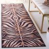 SAFAVIEH Washable Rug Faux Hide Collection – 5′ x 8′, Light Orange & Black, Slip Resistant, Tiger Print Pattern, Ideal for Living Room, Bedroom, Home Office, Dining Space (FAH547P)(Light Orange/Black)