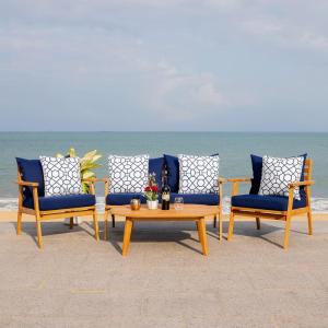 SAFAVIEH Outdoor Collection Deacon Natural Acacia Wood/Beige Cushion 4-Piece Conversation Patio Set with Accent Pillows(Navy/Natural)