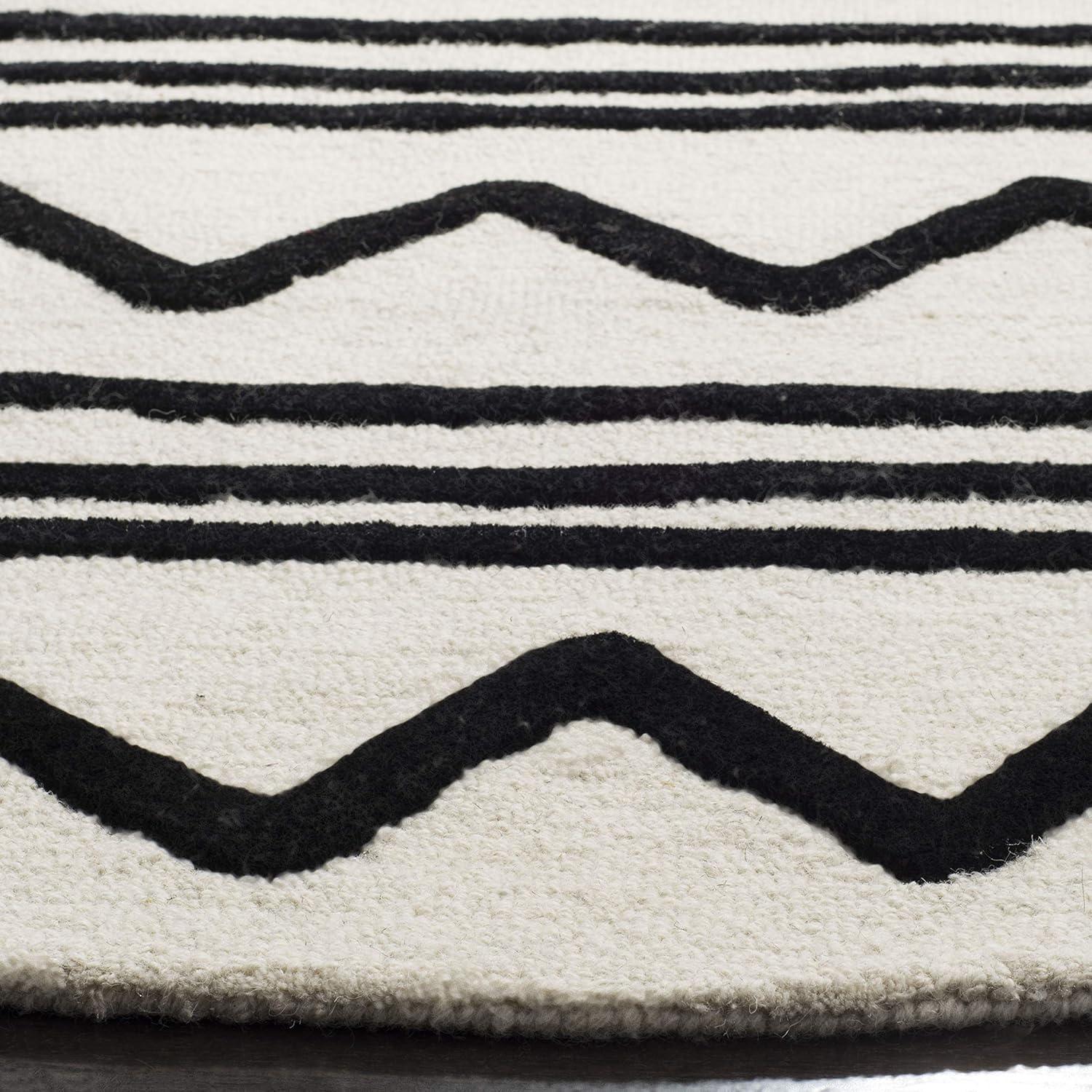 image:imageSAFAVIEH Kids Collection Area Rug 5 x 7 Navy amp Ivory Handmade Moroccan Wool Ideal for High Traffic Areas in Living Room Bedroom SFK907NIvoryBlack