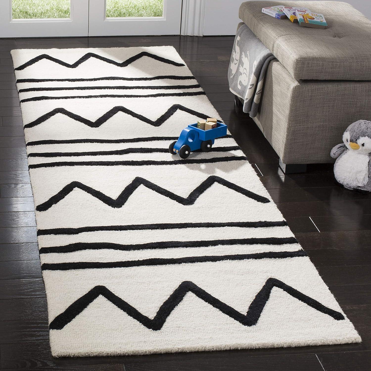 image:imageSAFAVIEH Kids Collection Area Rug 5 x 7 Navy amp Ivory Handmade Moroccan Wool Ideal for High Traffic Areas in Living Room Bedroom SFK907NIvoryBlack