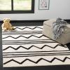 SAFAVIEH Kids Collection Area Rug – 5′ x 7′, Navy & Ivory, Handmade Moroccan Wool, Ideal for High Traffic Areas in Living Room, Bedroom (SFK907N)(Ivory/Black)