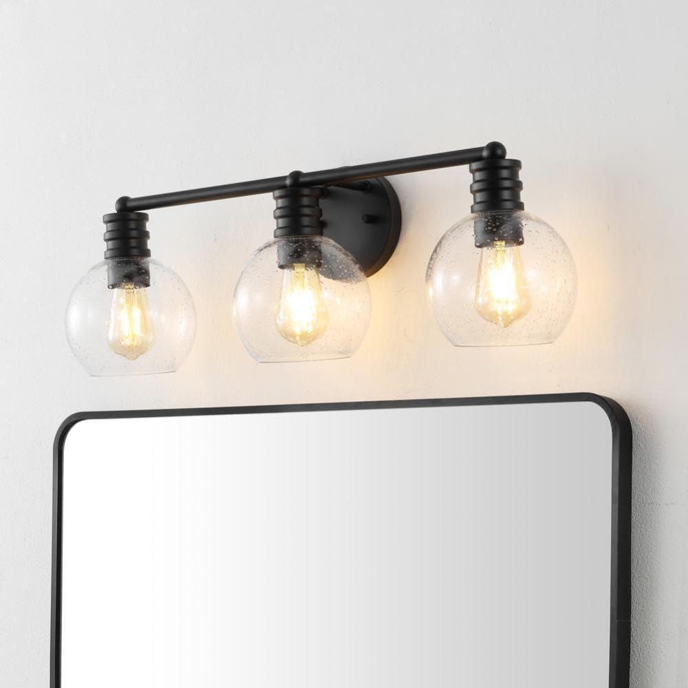 image:imageSAFAVIEH Lighting Collection Sunetta BlackClear Glass Globe Shade 3Light Wall Sconce Light Fixture Ideal for Bathroom Entryway Vanity Over Mirror Foyer Living Room LED Bulbs IncludedBlack