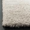 SAFAVIEH Flokati Shag Collection Area Rug – 6’7″ x 9′, Beige, Solid Design, Non-Shedding & Easy Care, 2.75-inch Thick Ideal for High Traffic Areas in Living Room, Bedroom (FLK950E)(Beige)