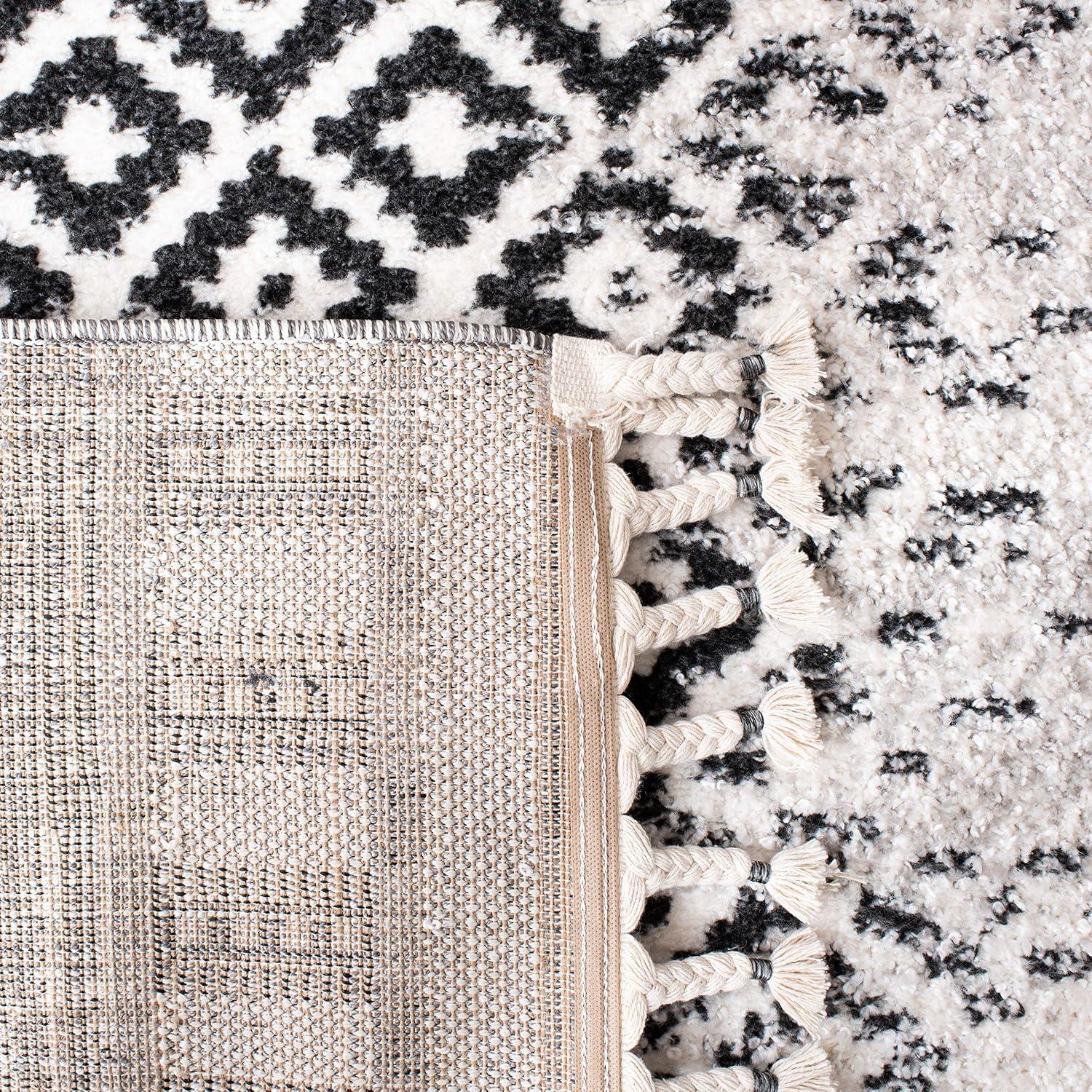 image:imageSAFAVIEH Moroccan Tassel Shag Collection Area Rug 55 x 77 Ivory amp Black 075inch Thick Ideal for High Traffic Areas in Living Room Bedroom MTS483A