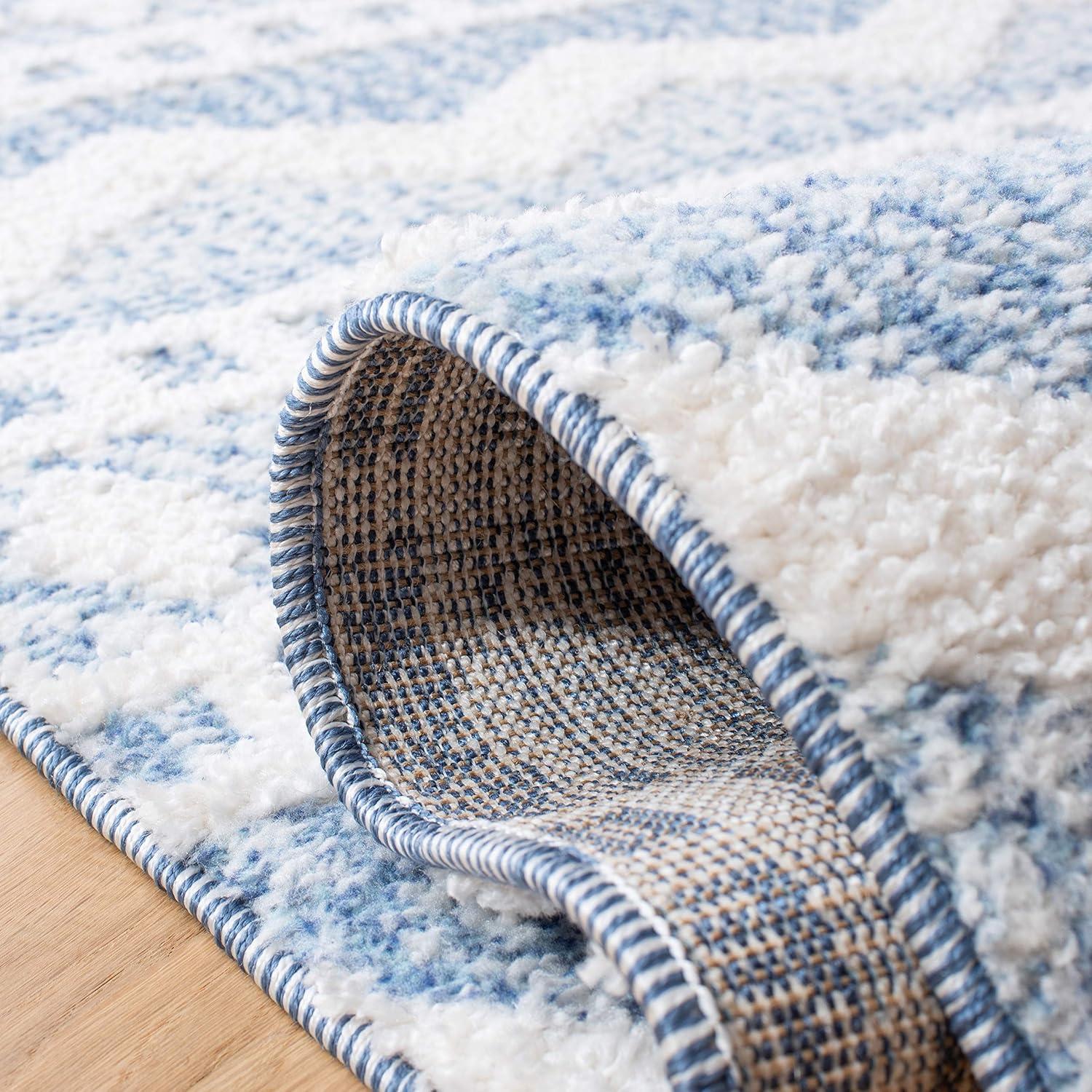 image:imageSAFAVIEH Moroccan Tassel Shag Collection Area Rug 55 x 77 Ivory amp Light Blue 075inch Thick Ideal for High Traffic Areas in Living Room Bedroom MTS484CIvoryLight Blue