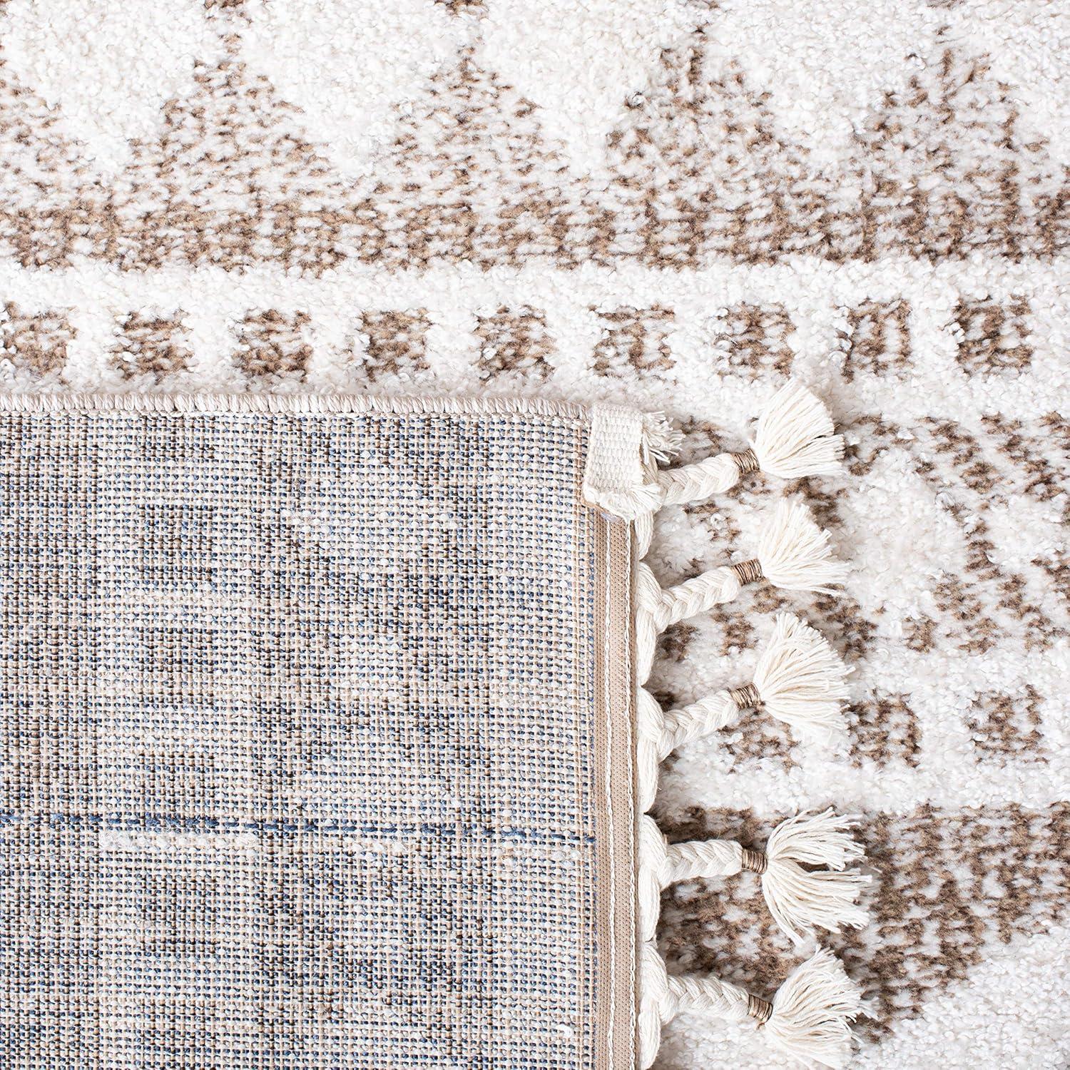 image:imageSAFAVIEH Moroccan Tassel Shag Collection Area Rug 55 x 77 Ivory amp Light Blue 075inch Thick Ideal for High Traffic Areas in Living Room Bedroom MTS484CIvoryBeige