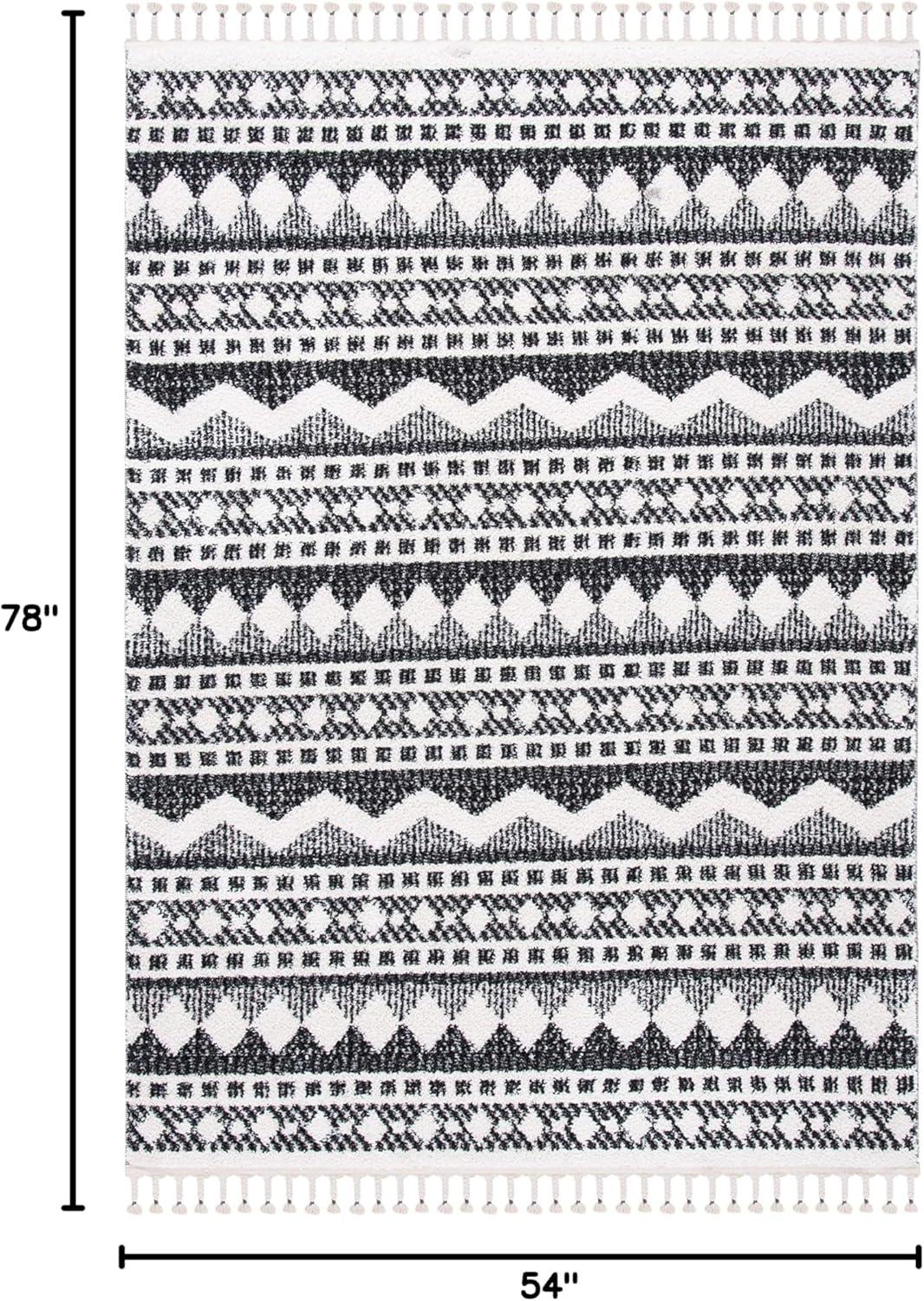 image:imageSAFAVIEH Moroccan Tassel Shag Collection Area Rug 55 x 77 Ivory amp Light Blue 075inch Thick Ideal for High Traffic Areas in Living Room Bedroom MTS484CIvoryBlack