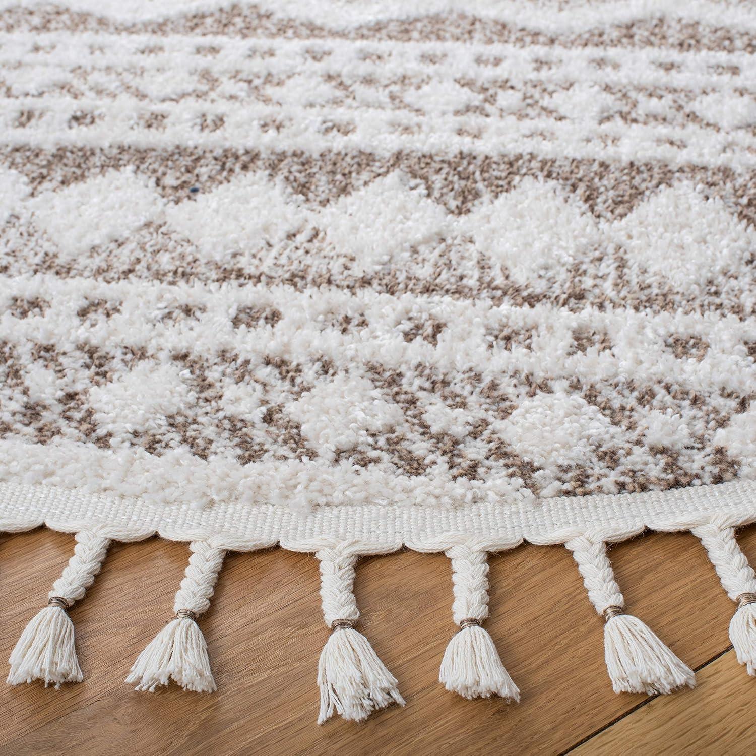 image:imageSAFAVIEH Moroccan Tassel Shag Collection Area Rug 55 x 77 Ivory amp Light Blue 075inch Thick Ideal for High Traffic Areas in Living Room Bedroom MTS484CIvoryBeige