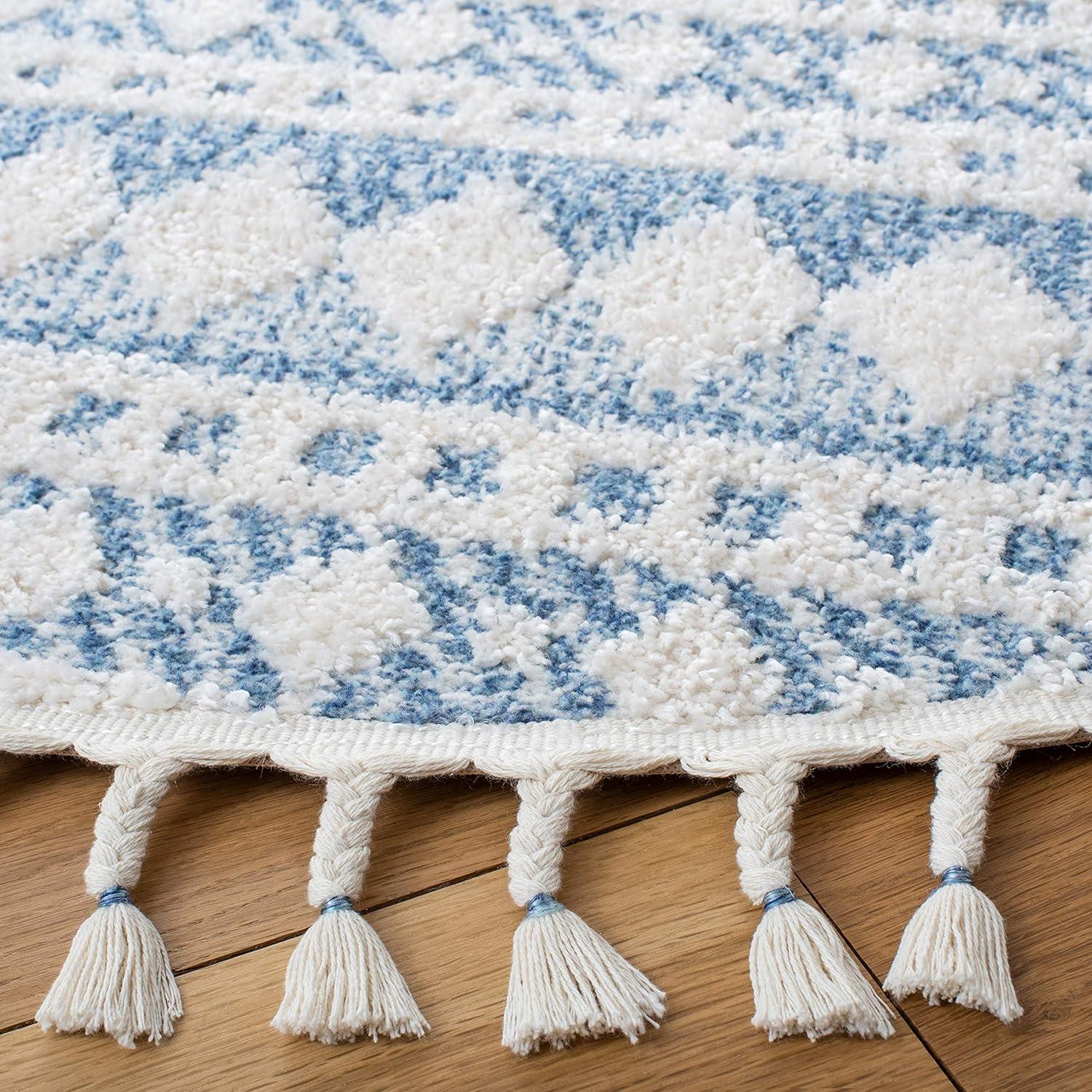 image:imageSAFAVIEH Moroccan Tassel Shag Collection Area Rug 55 x 77 Ivory amp Light Blue 075inch Thick Ideal for High Traffic Areas in Living Room Bedroom MTS484CIvoryLight Blue