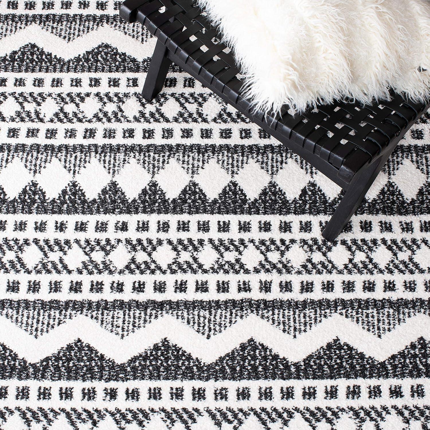 image:imageSAFAVIEH Moroccan Tassel Shag Collection Area Rug 55 x 77 Ivory amp Light Blue 075inch Thick Ideal for High Traffic Areas in Living Room Bedroom MTS484CIvoryBlack