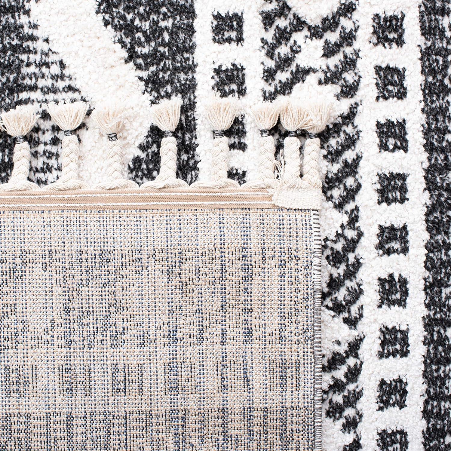 image:imageSAFAVIEH Moroccan Tassel Shag Collection Area Rug 55 x 77 Ivory amp Light Blue 075inch Thick Ideal for High Traffic Areas in Living Room Bedroom MTS484CIvoryBlack