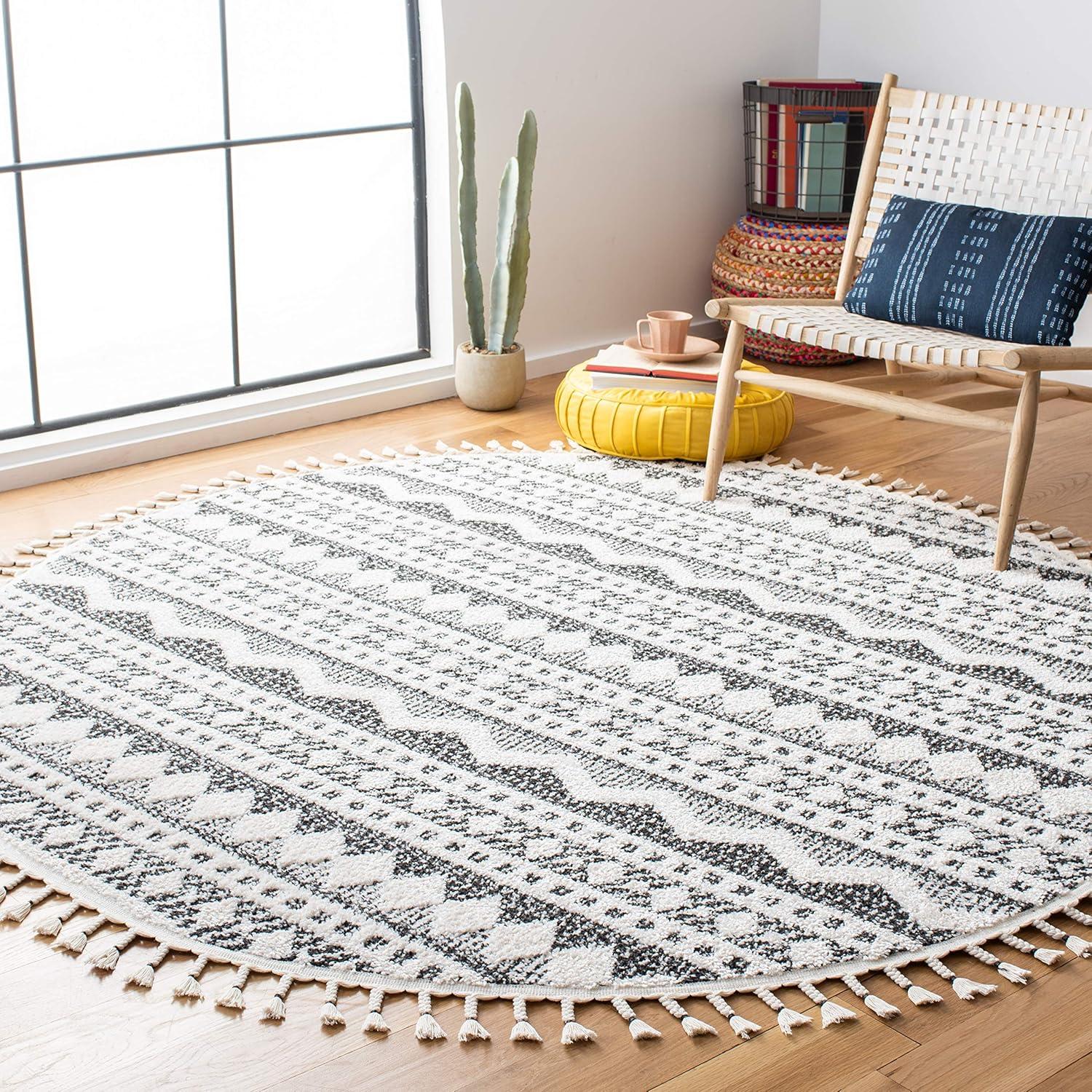 image:imageSAFAVIEH Moroccan Tassel Shag Collection Area Rug 55 x 77 Ivory amp Light Blue 075inch Thick Ideal for High Traffic Areas in Living Room Bedroom MTS484CIvoryBlack