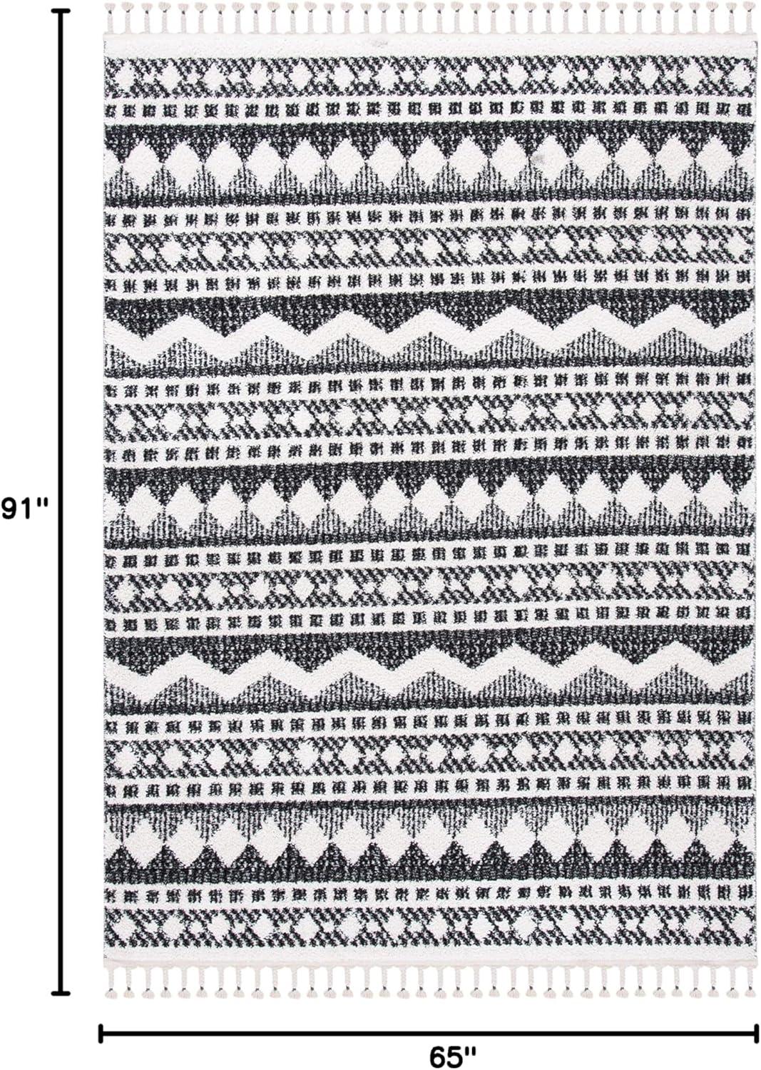 image:imageSAFAVIEH Moroccan Tassel Shag Collection Area Rug 55 x 77 Ivory amp Light Blue 075inch Thick Ideal for High Traffic Areas in Living Room Bedroom MTS484CIvoryBlack