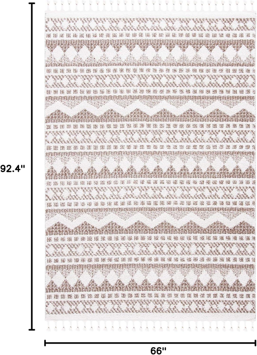 image:imageSAFAVIEH Moroccan Tassel Shag Collection Area Rug 55 x 77 Ivory amp Light Blue 075inch Thick Ideal for High Traffic Areas in Living Room Bedroom MTS484CIvoryBeige