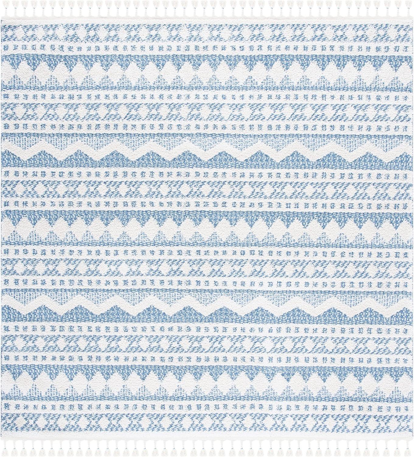 image:imageSAFAVIEH Moroccan Tassel Shag Collection Area Rug 55 x 77 Ivory amp Light Blue 075inch Thick Ideal for High Traffic Areas in Living Room Bedroom MTS484CIvoryLight Blue