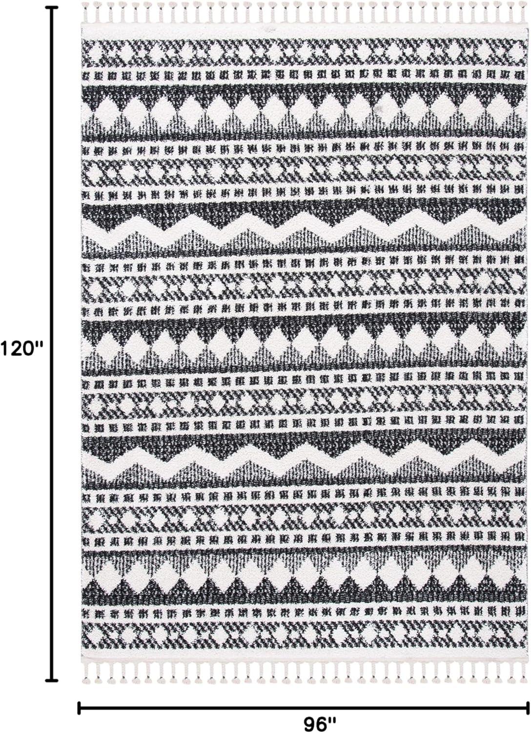 image:imageSAFAVIEH Moroccan Tassel Shag Collection Area Rug 55 x 77 Ivory amp Light Blue 075inch Thick Ideal for High Traffic Areas in Living Room Bedroom MTS484CIvoryBlack