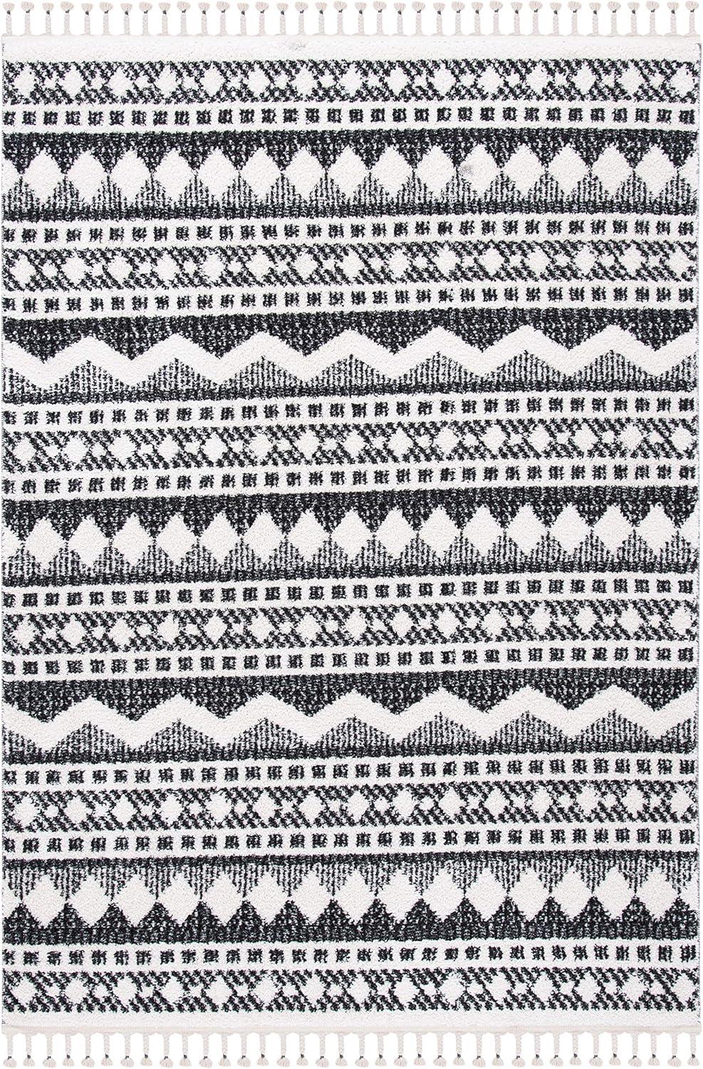 image:imageSAFAVIEH Moroccan Tassel Shag Collection Area Rug 55 x 77 Ivory amp Light Blue 075inch Thick Ideal for High Traffic Areas in Living Room Bedroom MTS484CIvoryBlack