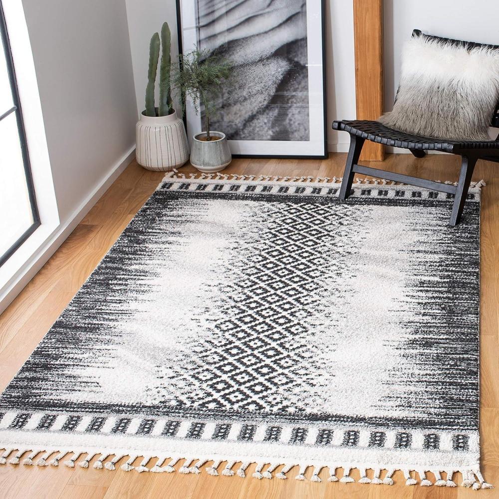 image:imageSAFAVIEH Moroccan Tassel Shag Collection Area Rug 55 x 77 Ivory amp Black 075inch Thick Ideal for High Traffic Areas in Living Room Bedroom MTS483A