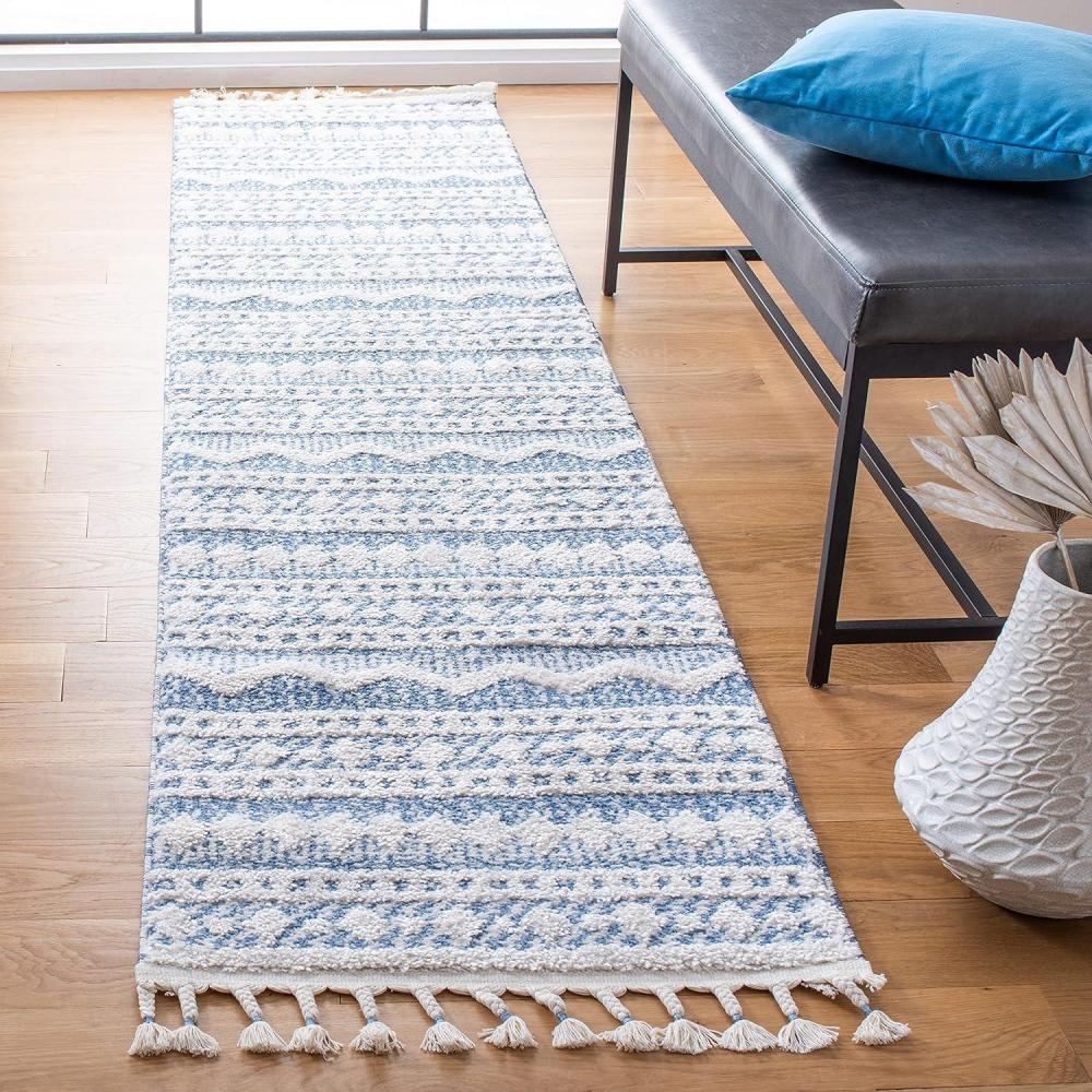 image:imageSAFAVIEH Moroccan Tassel Shag Collection Area Rug 55 x 77 Ivory amp Light Blue 075inch Thick Ideal for High Traffic Areas in Living Room Bedroom MTS484CIvoryLight Blue