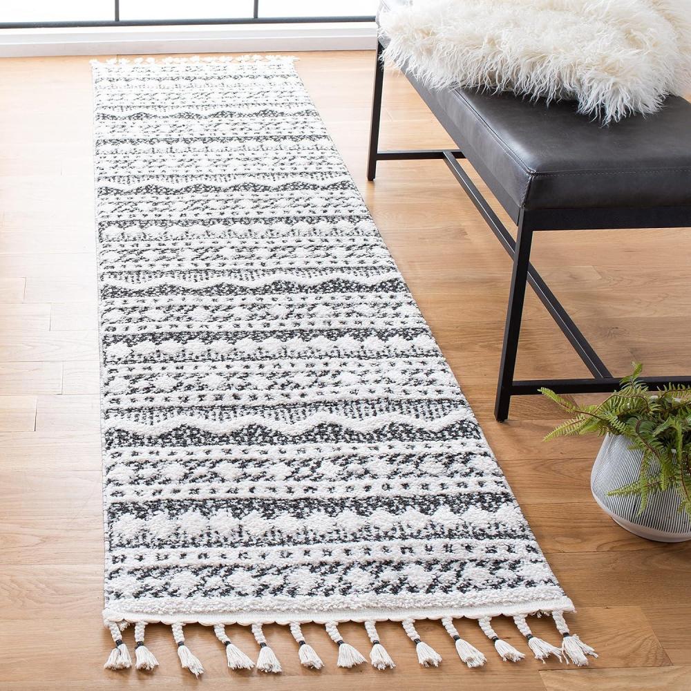 image:imageSAFAVIEH Moroccan Tassel Shag Collection Area Rug 55 x 77 Ivory amp Light Blue 075inch Thick Ideal for High Traffic Areas in Living Room Bedroom MTS484CIvoryBlack