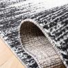 SAFAVIEH Moroccan Tassel Shag Collection Area Rug – 5’5″ x 7’7″, Ivory & Beige, Boho Design, Non-Shedding & Easy Care, 0.75-inch Thick Ideal for High Traffic Areas in Living Room, Bedroom (MTS483B)(Ivory/Black)