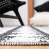 SAFAVIEH Moroccan Tassel Shag Collection Area Rug – 5’5″ x 7’7″, Ivory & Light Blue, 0.75-inch Thick Ideal for High Traffic Areas in Living Room, Bedroom (MTS484C)(Ivory/Black)
