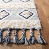 SAFAVIEH Natura Collection Accent Rug – 4′ x 6′, Ivory & Blue, Handmade Moroccan Boho Tassel Wool, Ideal for High Traffic Areas in Entryway, Living Room, Bedroom (NAT678A)(Ivory/Blue)