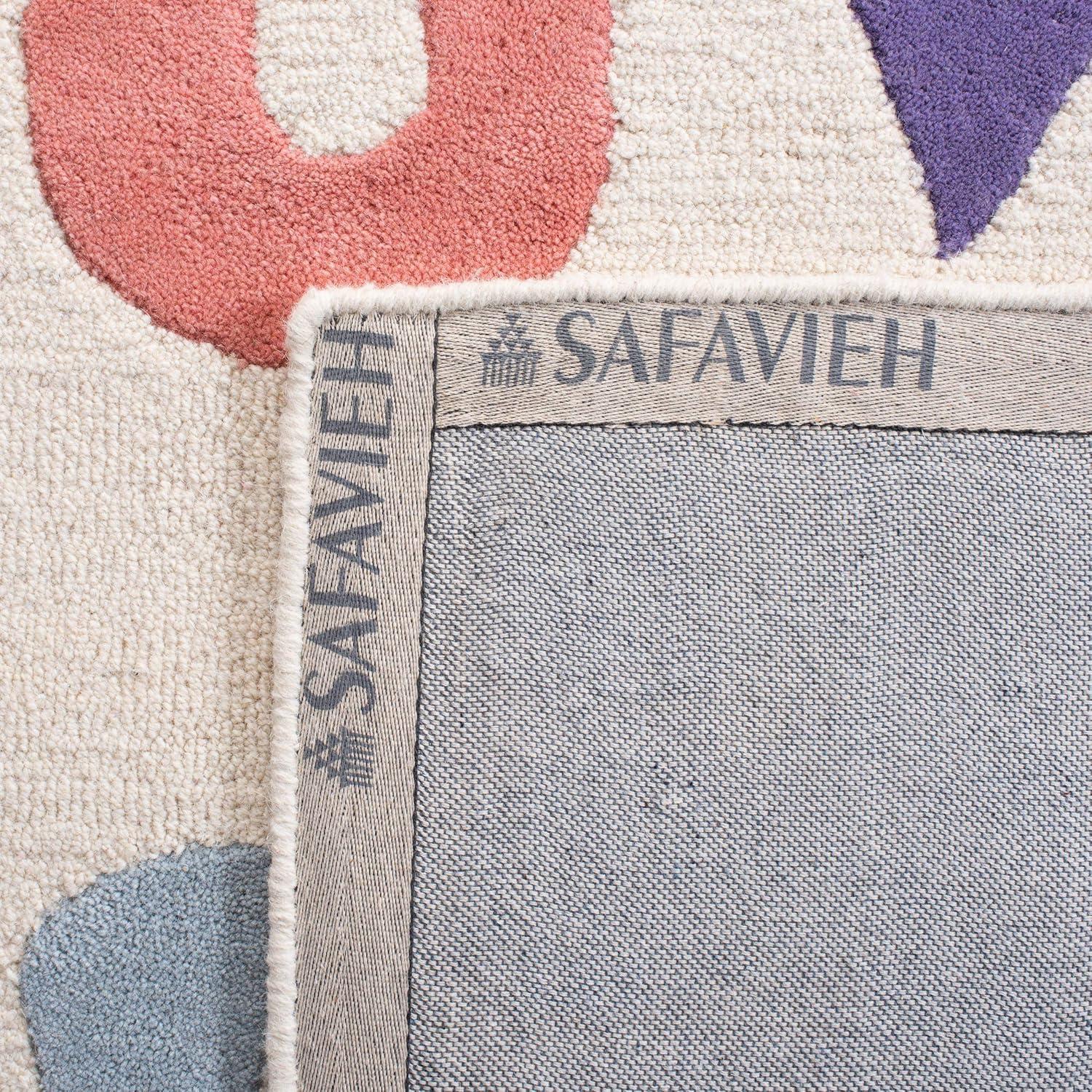 image:imageSAFAVIEH Kids Collection Area Rug 5 x 8 Ivory amp Multi Handmade Alphabet Letters Wool Ideal for High Traffic Areas in Living Room Bedroom SFK389AIvoryMulti