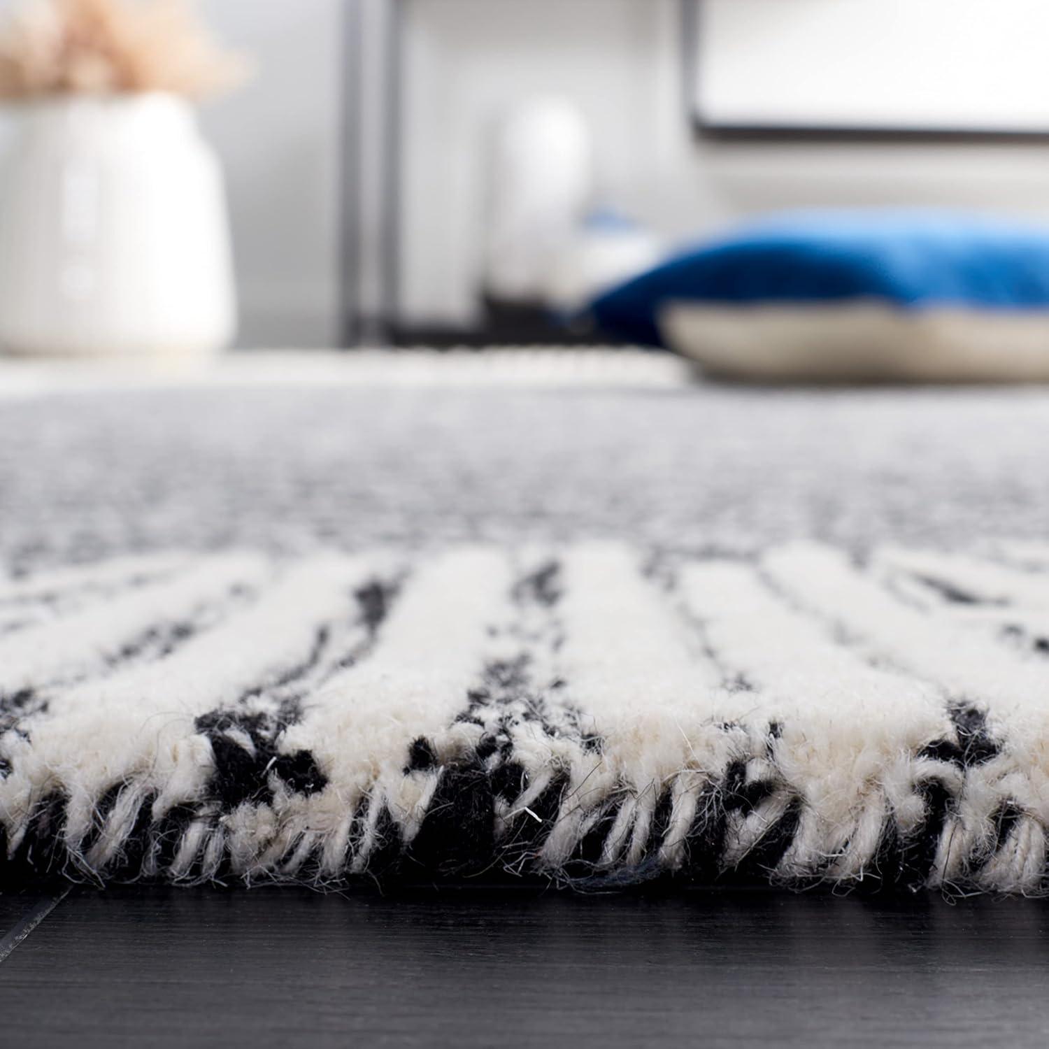 image:imageSAFAVIEH Abstract Collection Area Rug 5 x 8 Black amp Ivory Handmade Wool Ideal for High Traffic Areas in Living Room Bedroom ABT478ZBlackIvory