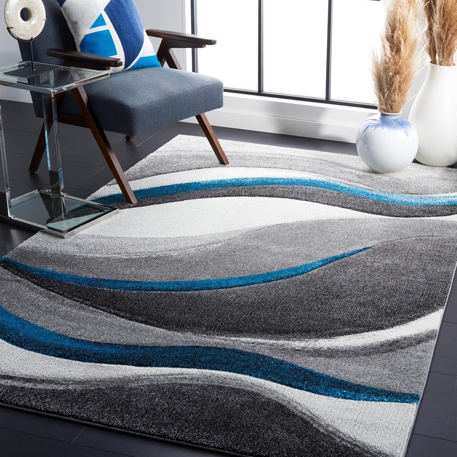 image:imageSAFAVIEH Hollywood Collection Area Rug 53 x 76 Grey amp Blue MidCentury Modern Design NonShedding amp Easy Care Ideal for High Traffic Areas in Living Room Bedroom HLW766FGreyTurquoise