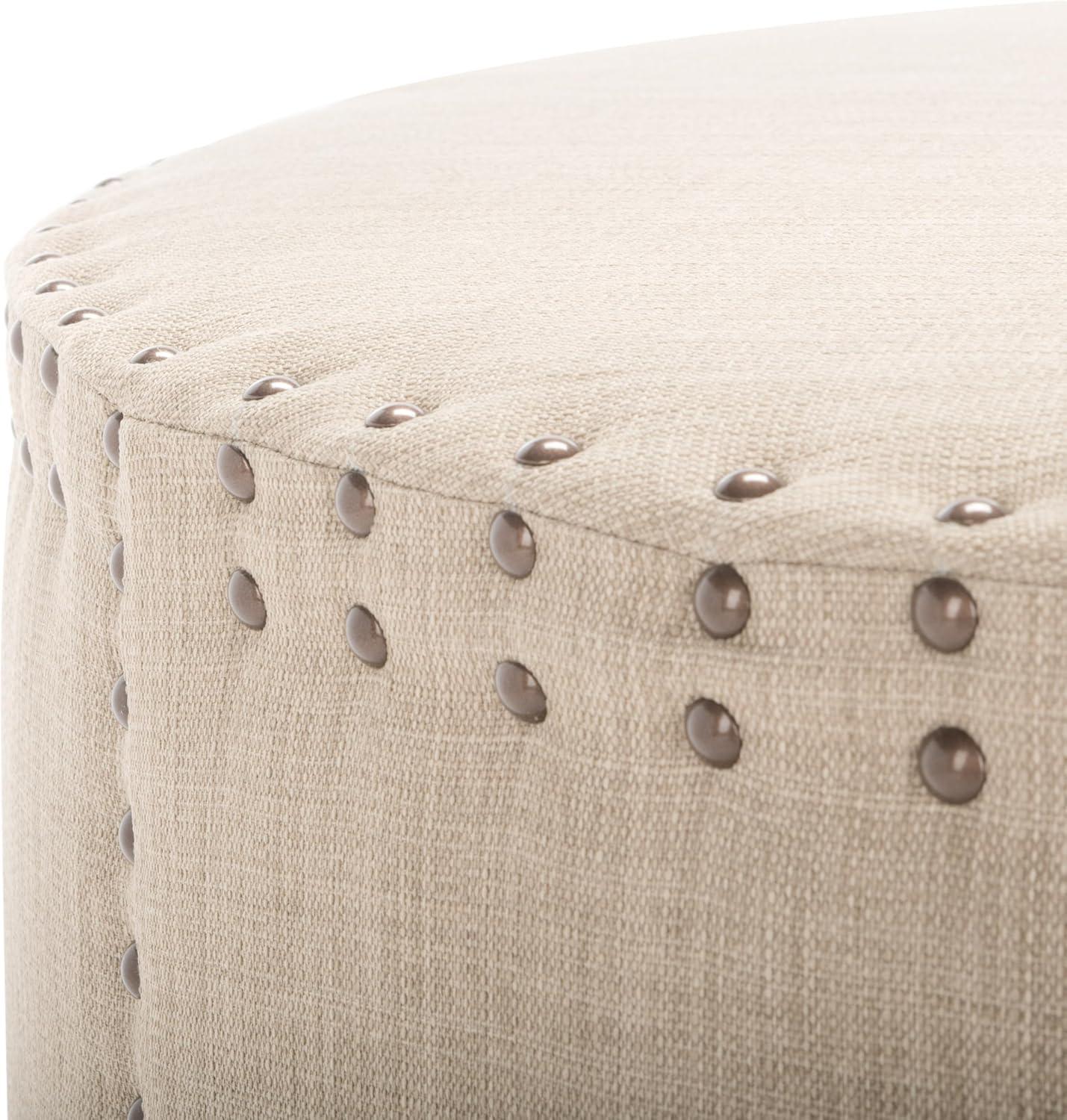image:imageSafavieh Mercer Collection Faith Beige Nailhead Round OttomanBeige