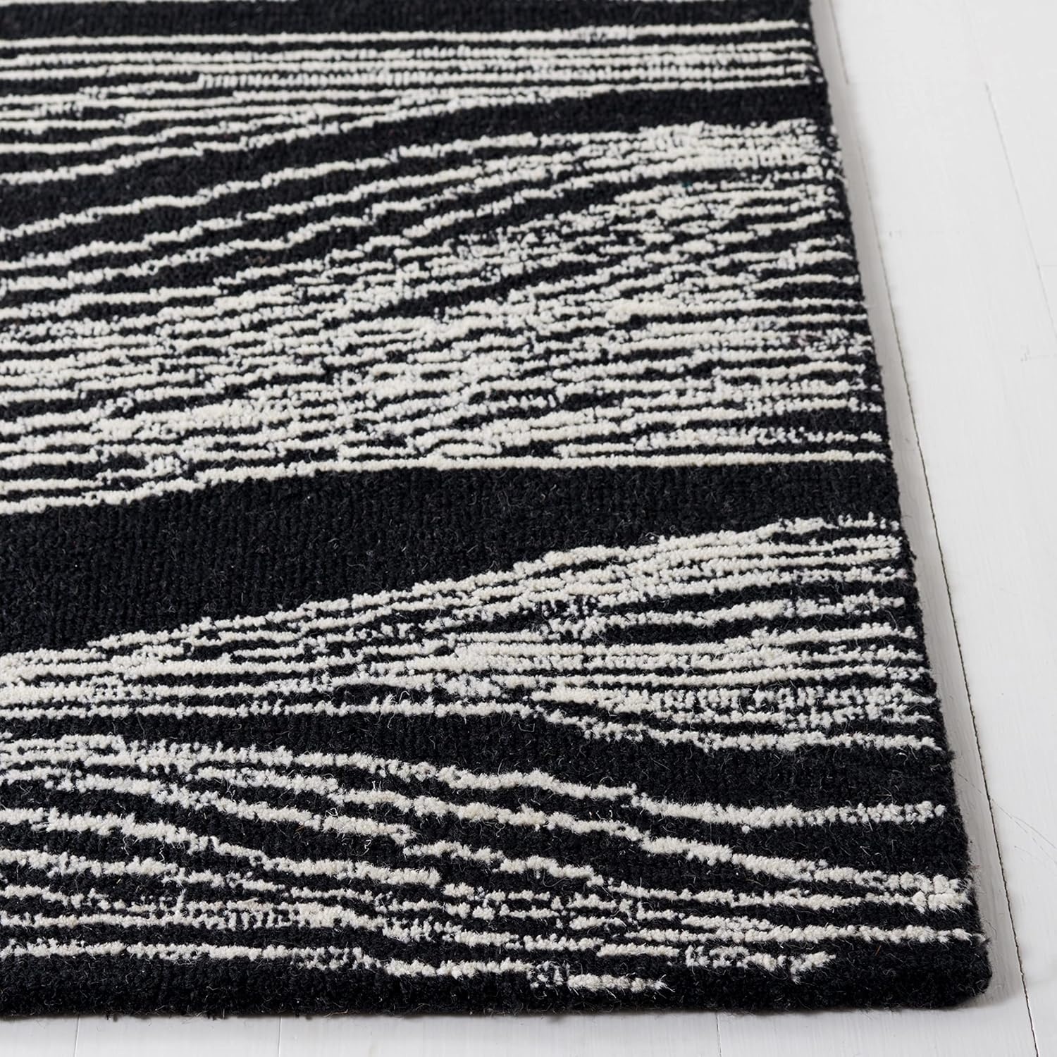 image:imageSAFAVIEH Metro Collection 8 x 10 NaturalIvory MET995A Handmade Premium Wool Living Room Dining Bedroom Area RugIvoryBlack